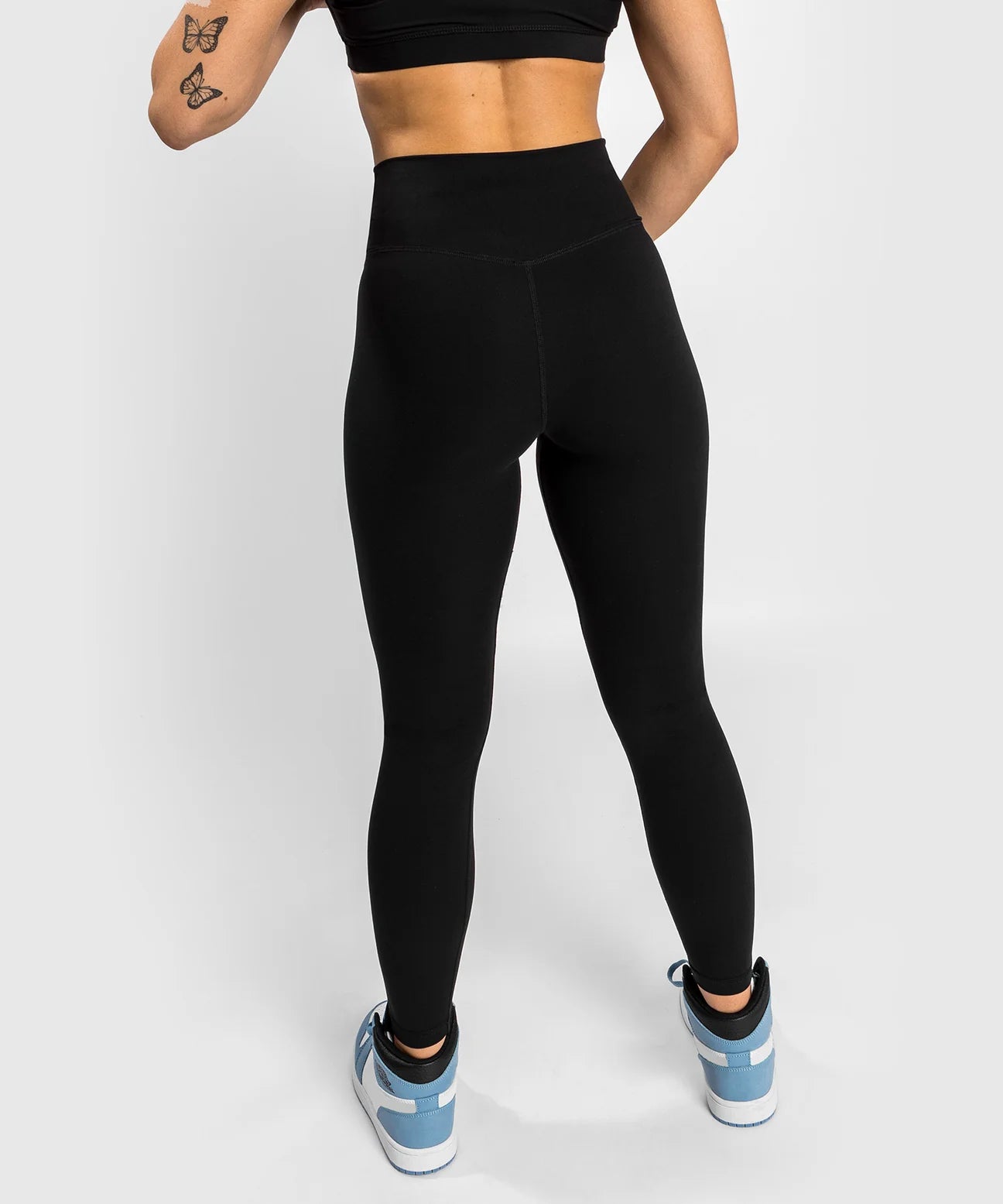 Venum Essential Lifestyle Leggings - high-waisted, compressive, logo detailing. Back View