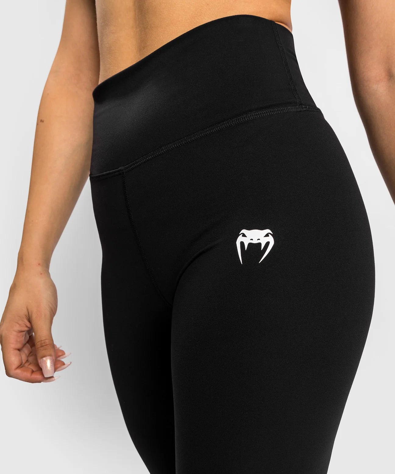 Venum Essential Lifestyle Leggings - high-waisted, compressive, logo detailing. Close up